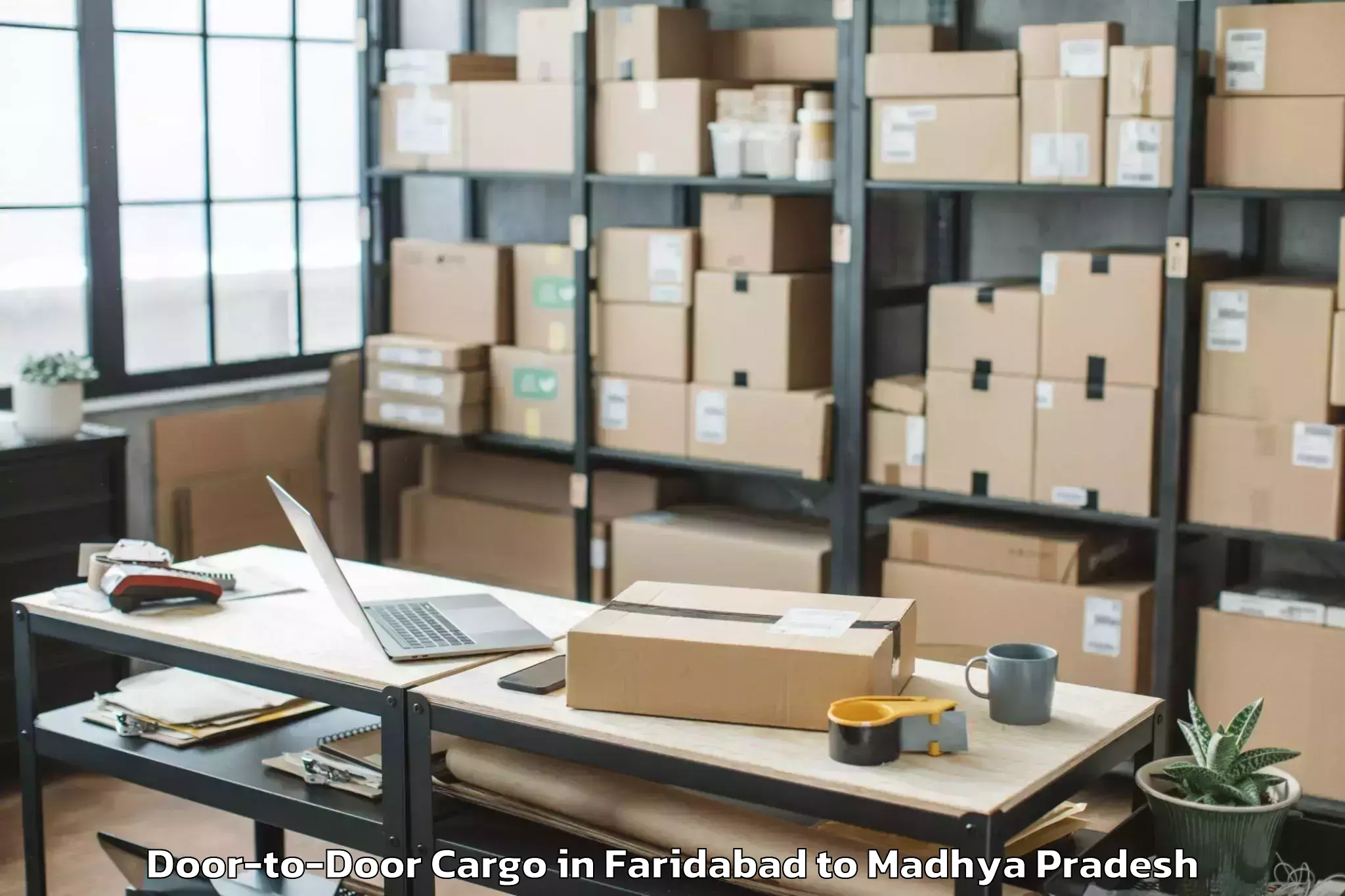 Book Your Faridabad to Thikri Door To Door Cargo Today